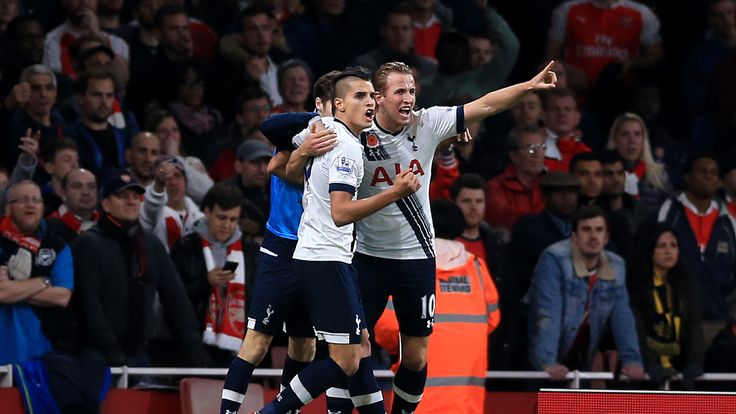 Tottenham Hotspur's Harry Kane (right) celebrates scoring their first goal against Arsenal with team-mate Erik Lamela (left)