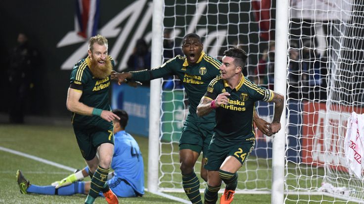 Liam Ridgewell #24 of Portland Timbers celebrates after scoring against FC Dallas