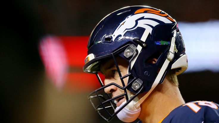 Quarterback Peyton Manning #18 of the Denver Broncos looks on during the fourth quarter against the Green Bay Packers at Sports 