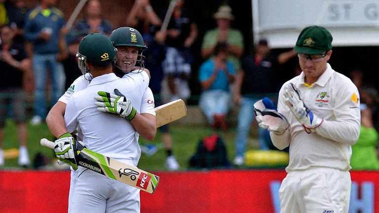 South Africa's AB de Villiers raises his bat after scoring one hundred runs during the second test match between South Africa and Australia at St George's 