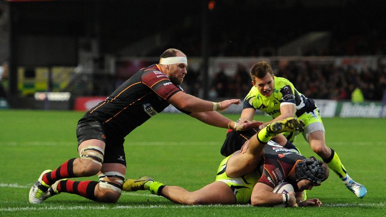 NEWPORT, WALES - NOVEMBER 15: Adam Hughes of Newport Gwent Dragons goes over for his sides third try during the European Rugby Challenge Cup match between 