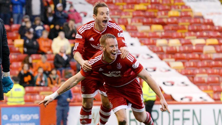 Aberdeen's Adam Rooney celebrates after making it 1-0 v Dundee United in the Scottish Premiership