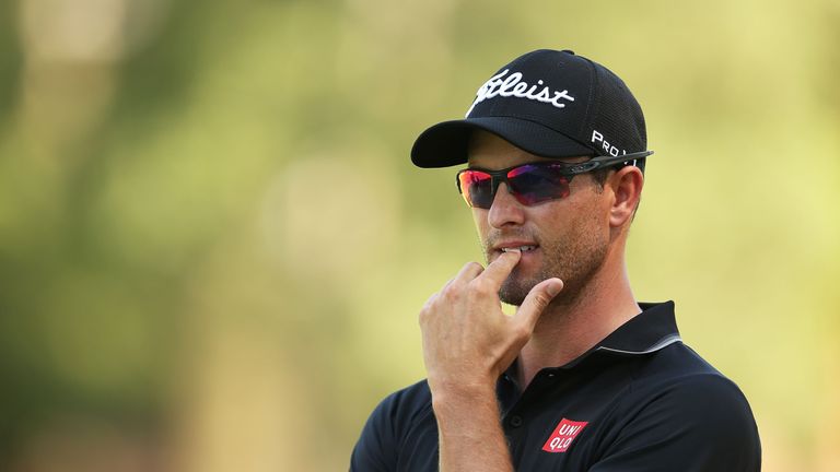 Adam Scott of Australia waits to play his fairway shot on the 16th hole during day four of the Australian Open 