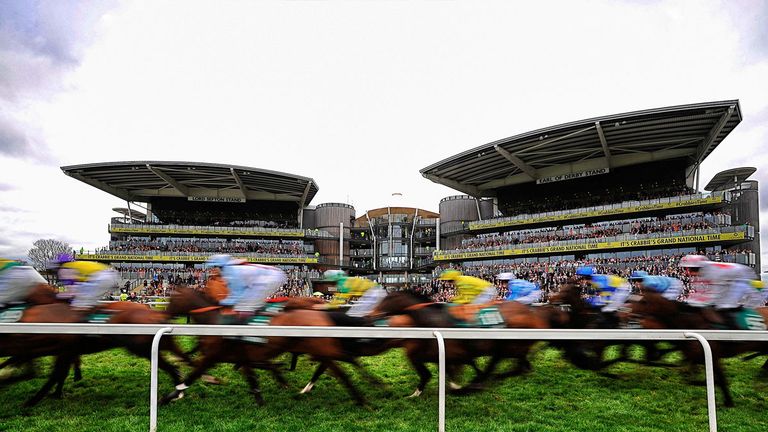 LIVERPOOL, ENGLAND - APRIL 04:  (EDITORS NOTE: This image was processed using digital filters) Runners pass the grandstands in The Alder Hey Children's Cha