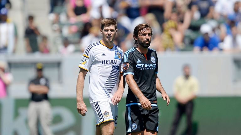 Steven Gerrard #8 of Los Angeles Galaxy bumps Andrea Pirlo #21 of New York City FC during the second half at StubHub Center, MLS