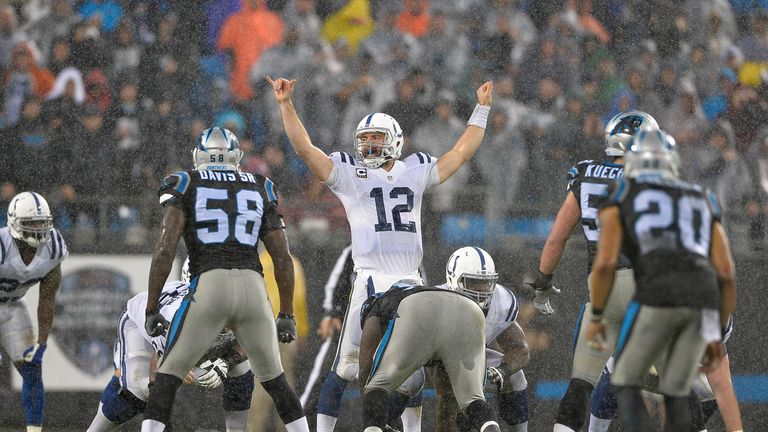 Andrew Luck #12 of the Indianapolis Colts calls instructions at the line of scrimmage against the Carolina Panthers 