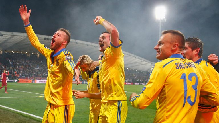 Andriy Yarmolenko of Ukraine celebrates his goal 
