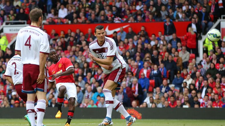 Andy Cole pictured scoring for a Manchester United Legends side against Bayern Munich All Stars in June