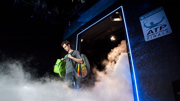 Andy Murray of Great Britain enters the court ahead of his round robin singles match against Roger Federer of Switzerland o