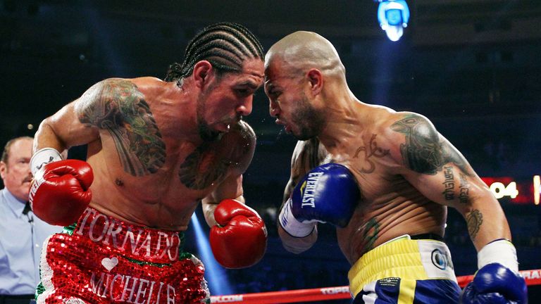 NEW YORK, NY - DECEMBER 03:  Miguel Cotto (R) of Puerto Rico and Antonio Margarito of Mexico exchange blows during the WBA World Junior Middleweight Title 