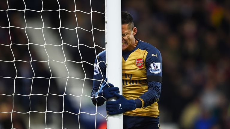  Alexis Sanchez of Arsenal reacts after missing a chance against West Brom