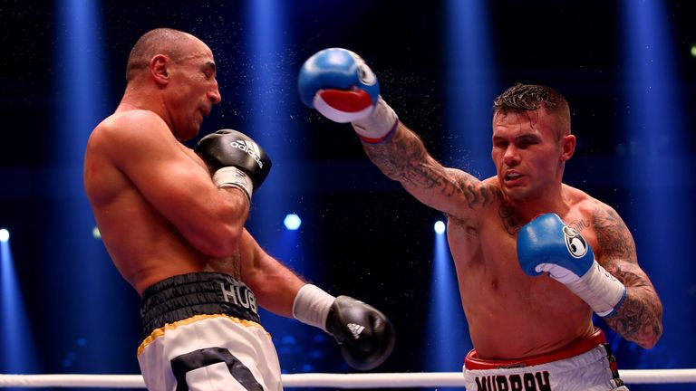 Arthur Abraham (L) and Martin Murray exchange punches during the WBO World Championship Super Middleweight title fight at TUI Arena, Hannover