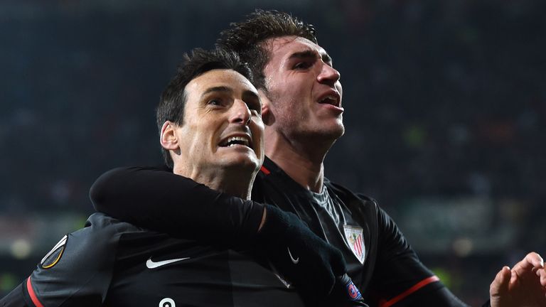 Bilbao's striker Aritz Aduriz (L) and Bilbao's French defender Aymeric Laporte (R) celebrate scoring during the 
