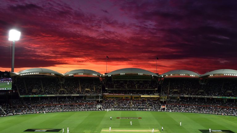 The sun sets over the Adelaide Oval during the first day-night cricket Test match between Australia and New Zealand in Adelaide