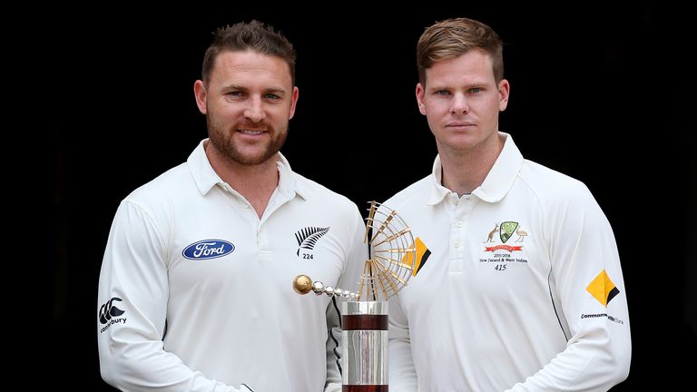 New Zealand captain Brendon McCullum (left) and Australia captain Steve Smith hold the Trans-Tasman Trophy