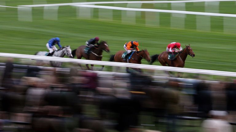 Ballyandy (red and white silks), ridden by Sam Twiston-Davies, streaks to victory in the Open meeting finale