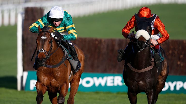 Barry Geraghty riding More Of That (left) clear to win the Steel Plate And Sections Novices' Steeple Chase from As De Mee