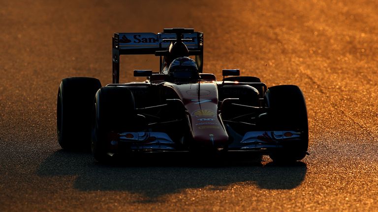 In the red: Kimi Raikkonen tests the new Ferrari at Barcelona - Picture by Mark Thompson, Getty Images
