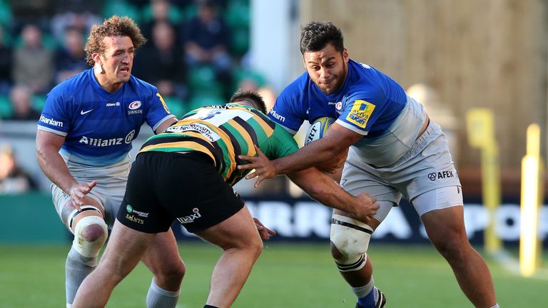 Billy Vunipola of Saracens takes on Kieran Brookes during the Aviva Premiership match between Northampton