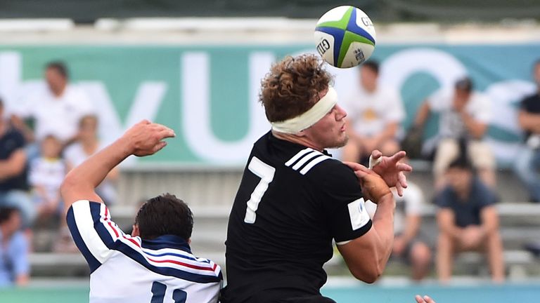 New Zealand flanker Blake Gibson (C) jumps for the ball during the Rugby Union World Cup U20 championship vs France
