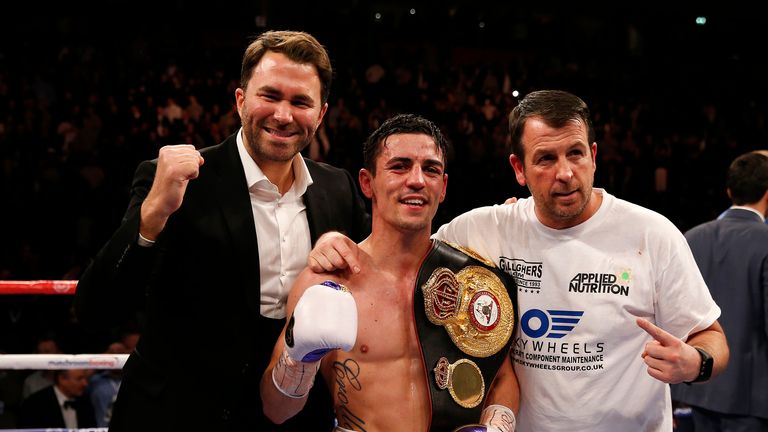 Anthony Crolla celebrates victory over Darleys Perez with trainer Joe Gallagher and promoter Eddie Hearn (left) during the WBA World lightweight title