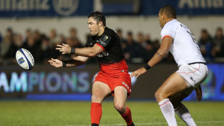 Brad Barritt of Saracens passes the ball during the European Rugby Champions Cup match between Saracens and Toulouse