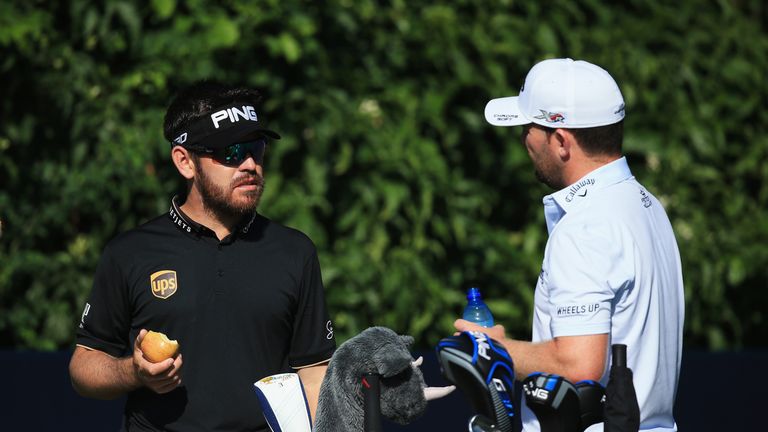 MALELANE, SOUTH AFRICA - NOVEMBER 26:  Louis Oosthuizen (L) of South Africa talks to Branden Grace of South Africa during day one of the Alfred Dunhill Cha