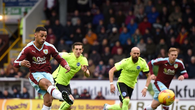 Burnley's Andre Gray scores from the penalty spot