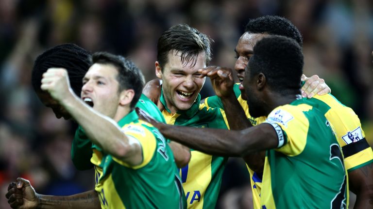 Norwich City's Jonny Howson (centre) celebrates scoring his side's winning goal against Swansea