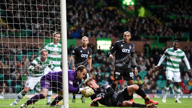 Celtic's Leigh Griffiths (far left) rues a missed chance in the first half against Kilmarnock as Jamie MacDonald gathers the ball