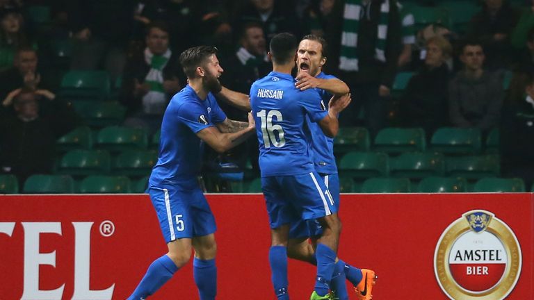 Daniel Berg Hestad (R) of Molde celebrates with team-mates Joona Toivo (L) and Etzaz Hussain (C) after scoring v Celtic, Europa League