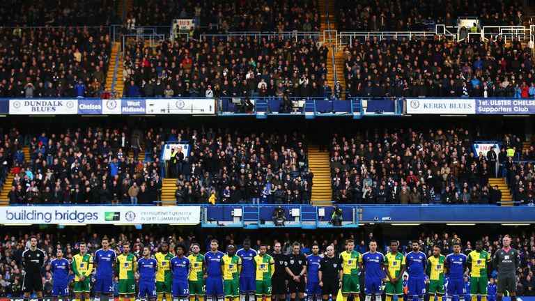 Chelsea and Norwich players line up before the Premier League game at Stamford Bridge