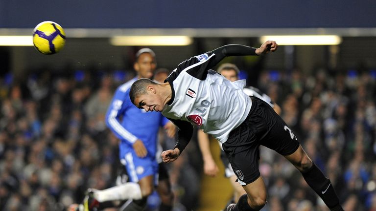 Fulham defender Chris Smalling heads the ball clear during the Premier League football match between Chelsea and Fulham at Stamford Bridge in 2009/10