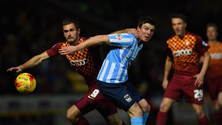 James Hanson of Bradford City battles with Coventry's Chris Stokes