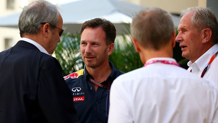 Red Bull's Christian Horner and Helmut Marko speak with Renault Sport chairman Jerome Stoll (left) in Abu Dhabi