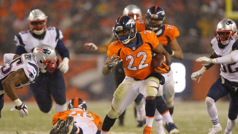 DENVER, CO - NOVEMBER 29: Running back C.J. Anderson #22 of the Denver Broncos carries the ball for an overtime touchdown to defeat the New England Patriot