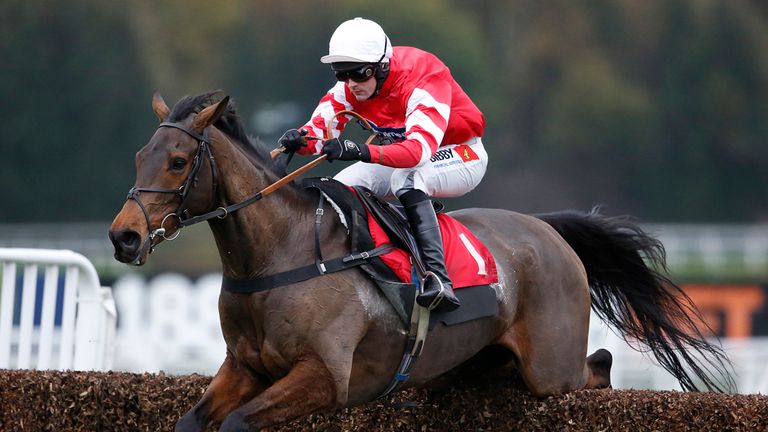 ESHER, ENGLAND - NOVEMBER 08:  Nico de Boinville riding Coneygree clear the last to win the 188Bet Future Stars Steeple Chase at Sandown racecourse.