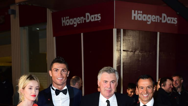 A guest, Cristiano Ronaldo, Carlo Ancelotti and Jorge Mendes attending the world premiere of Ronaldo at Vue West End Cinema in Leicester Square