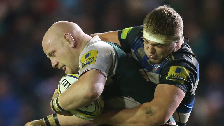 Dan Cole is tackled during the Aviva Premiership match between Leicester Tigers and Bath at Welford Road 
