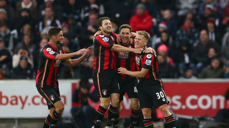 Dan Gosling (2nd R) of Bournemouth celebrates scoring his team's second goal 