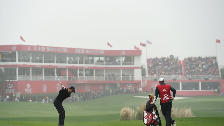 SHANGHAI, CHINA - NOVEMBER 08:  Danny Willett of England hits his second shot on the 18th hole during the final round of the WGC - HSBC Champions at the Sh
