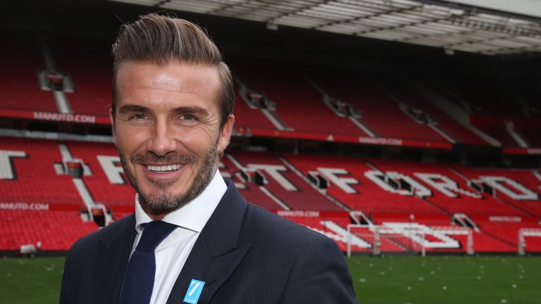 David Beckham poses on the pitch at Old Trafford