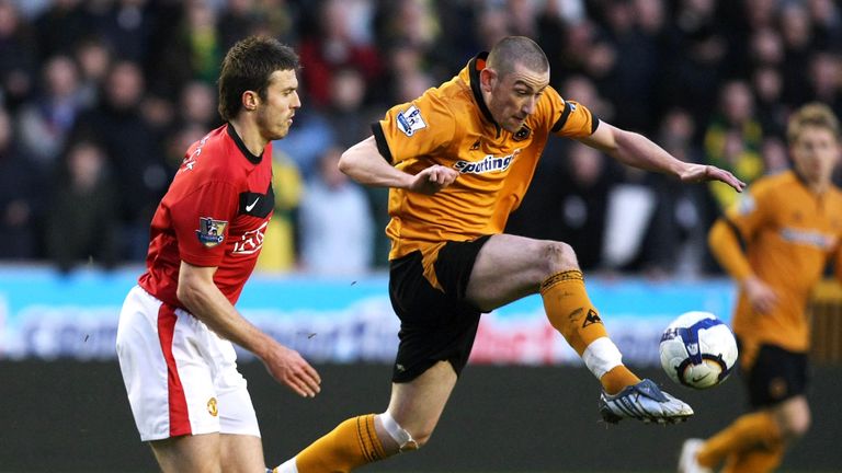 Michael Carrick of Manchester United clashes with David Jones of Wolverhampton Wanderers during the Premier League match at Molineux on March 6 2010 