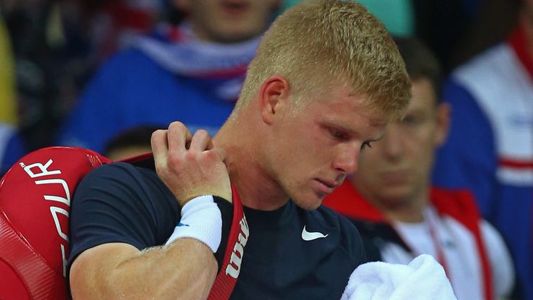 A dejected Kyle Edmund walks off the court following his defeat to David Goffin in the Davis Cup final