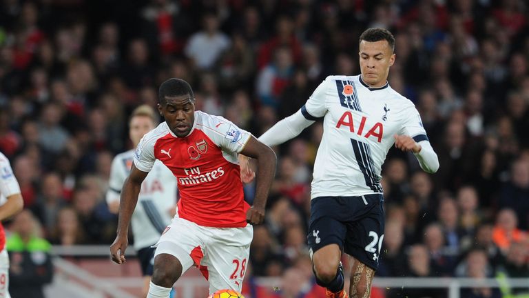 Dele Alli battles Joel Campbell for the ball during the north london derby