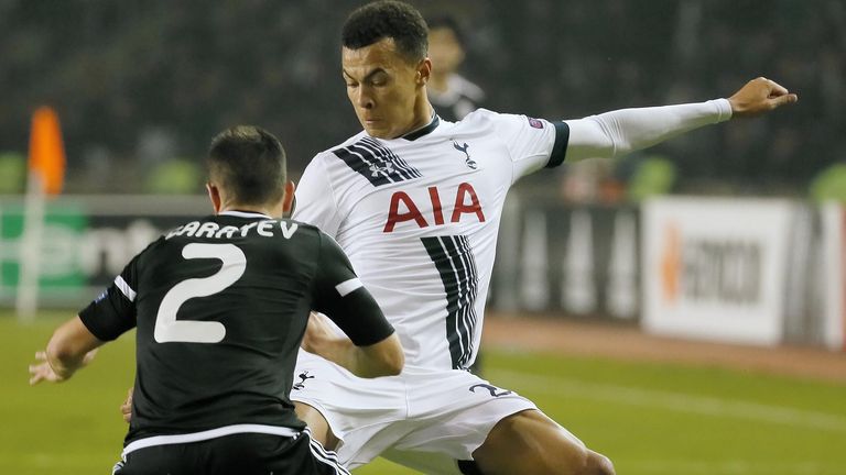 BAKU, AZERBAIJAN - NOVEMBER 26: Gara Garayev of Qarabag FK challenged by Dele Alli of Tottenham Hotspur FC during the UEFA Europe League match between Qara