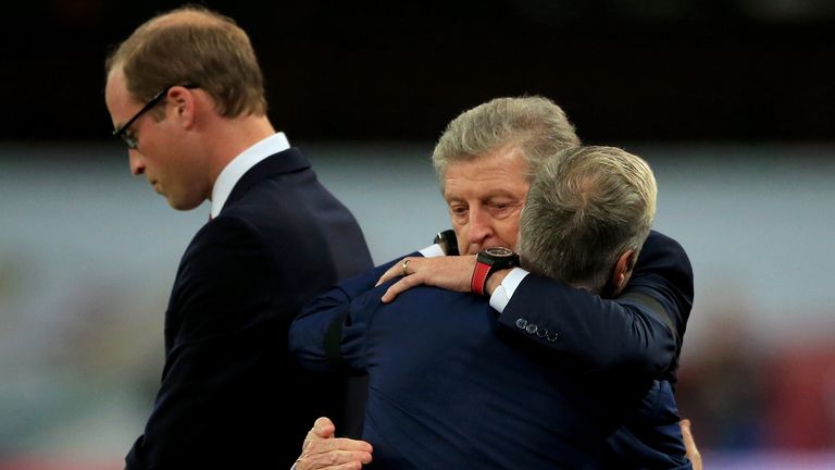 England manager Roy Hodgson embraces France manager Didier Deschamps before the international friendly match at Wembley Stadium, London.