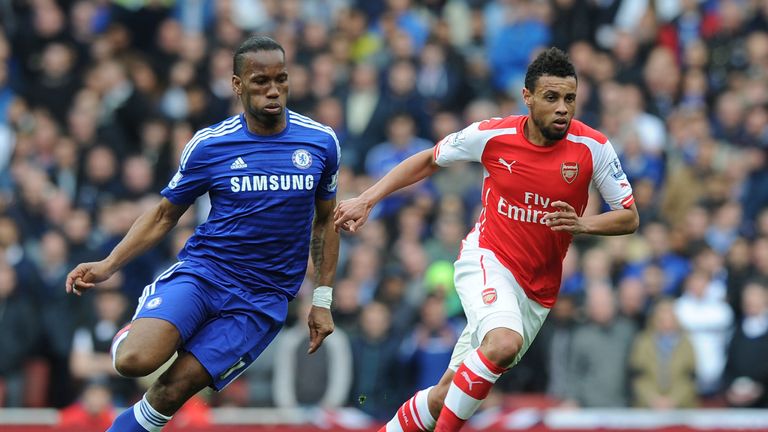 Francis Coquelin and Didier Drogba of Chelsea during the match between Arsenal and Chelsea at Emirates Stadium on April 26, 2015 in London, England