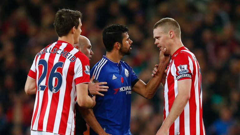 Diego Costa clashes with Ryan Shawcross during Chelsea's defeat to Stoke