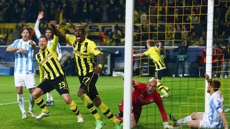 Felipe Santana celebrates scoring Dortmund's controversial equaliser against Malaga